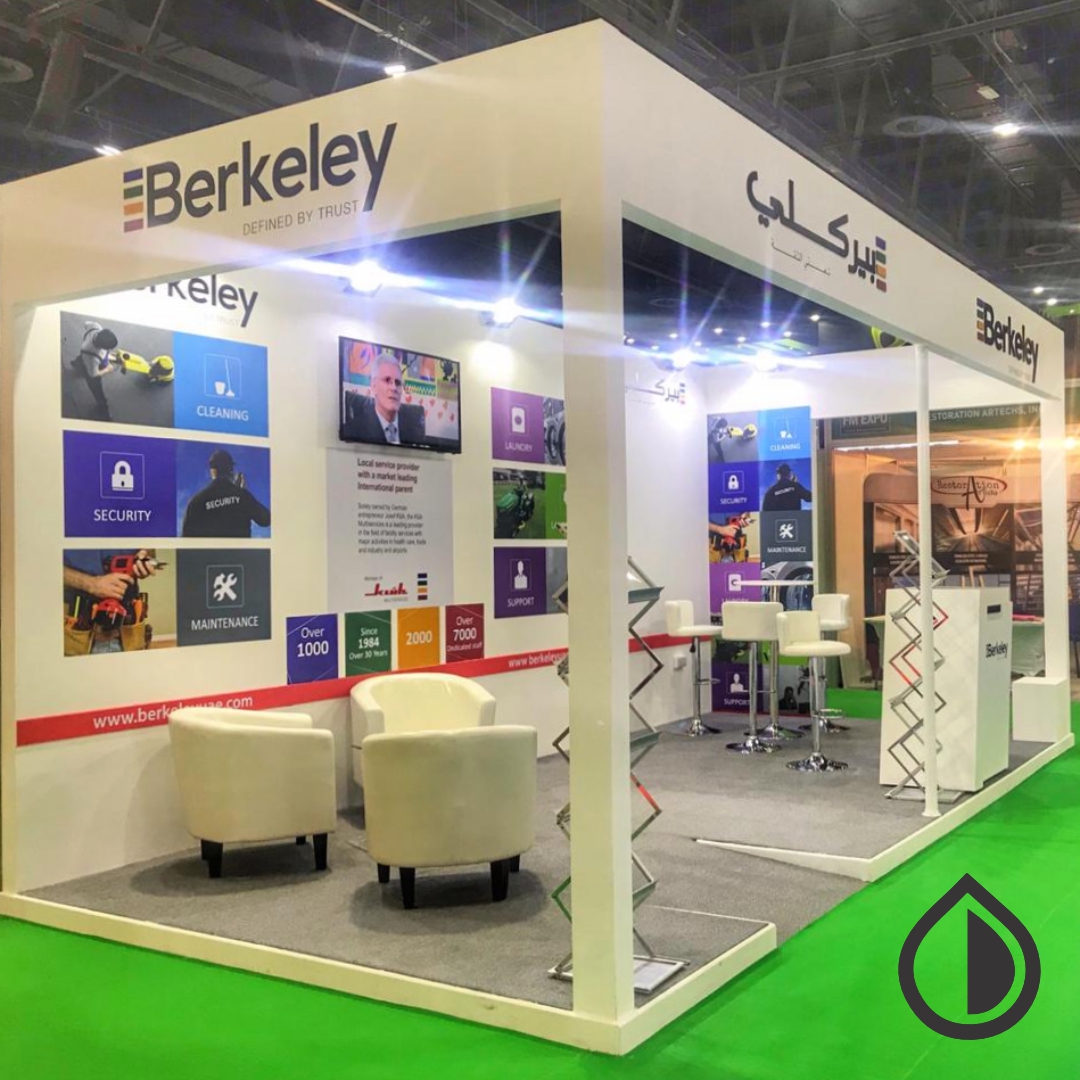 Custom exhibition booth with branded panels, banners, and promotional displays designed for events, expos, and trade shows in Dubai.