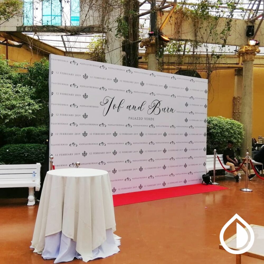 Custom printed backdrops for events, trade shows, and branding in Dubai. High-quality fabric, vinyl, and mesh options with vibrant full-color prints.