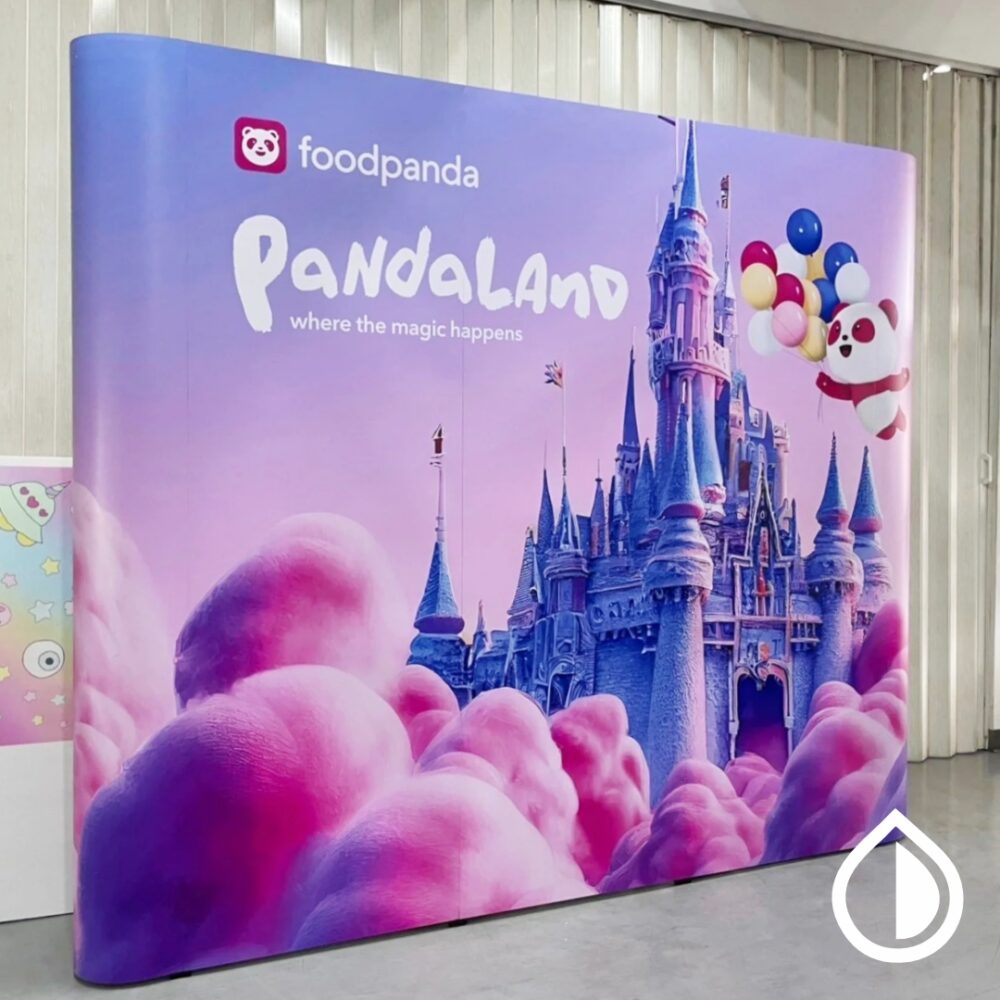 Custom printed backdrops for events, trade shows, and branding in Dubai. High-quality fabric, vinyl, and mesh options with vibrant full-color prints.