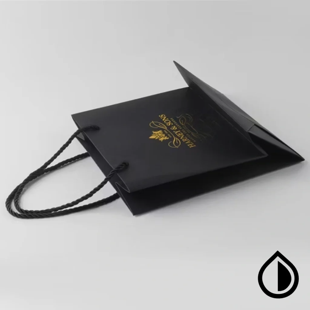 Eco-friendly custom paper bags with premium printing and reinforced handles for retail and branding